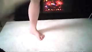 SEXY FEET BY THE FIREPLACE